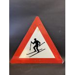 A 'skiing' triangular road sign, 34 x 29 3/4".