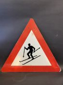 A 'skiing' triangular road sign, 34 x 29 3/4".