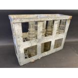 An Essolube galvanised 12 division crate containing eight Essolube pint bottles.