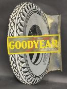 A Goodyear tyre shaped double sided enamel sign with hanging flange by Franco, some old amateur