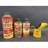 A Shell X-100 Motor Oil quart can, two Shell pint cans and a Shell half pint measure.