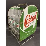 A good Wakefield Castrol Motor Oil garage forecourt nine division bottle crate with an enamel sign