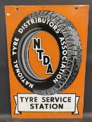 A National Tyre Distributors Association rectangular double sided enamel sign with some older