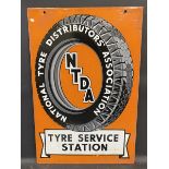 A National Tyre Distributors Association rectangular double sided enamel sign with some older