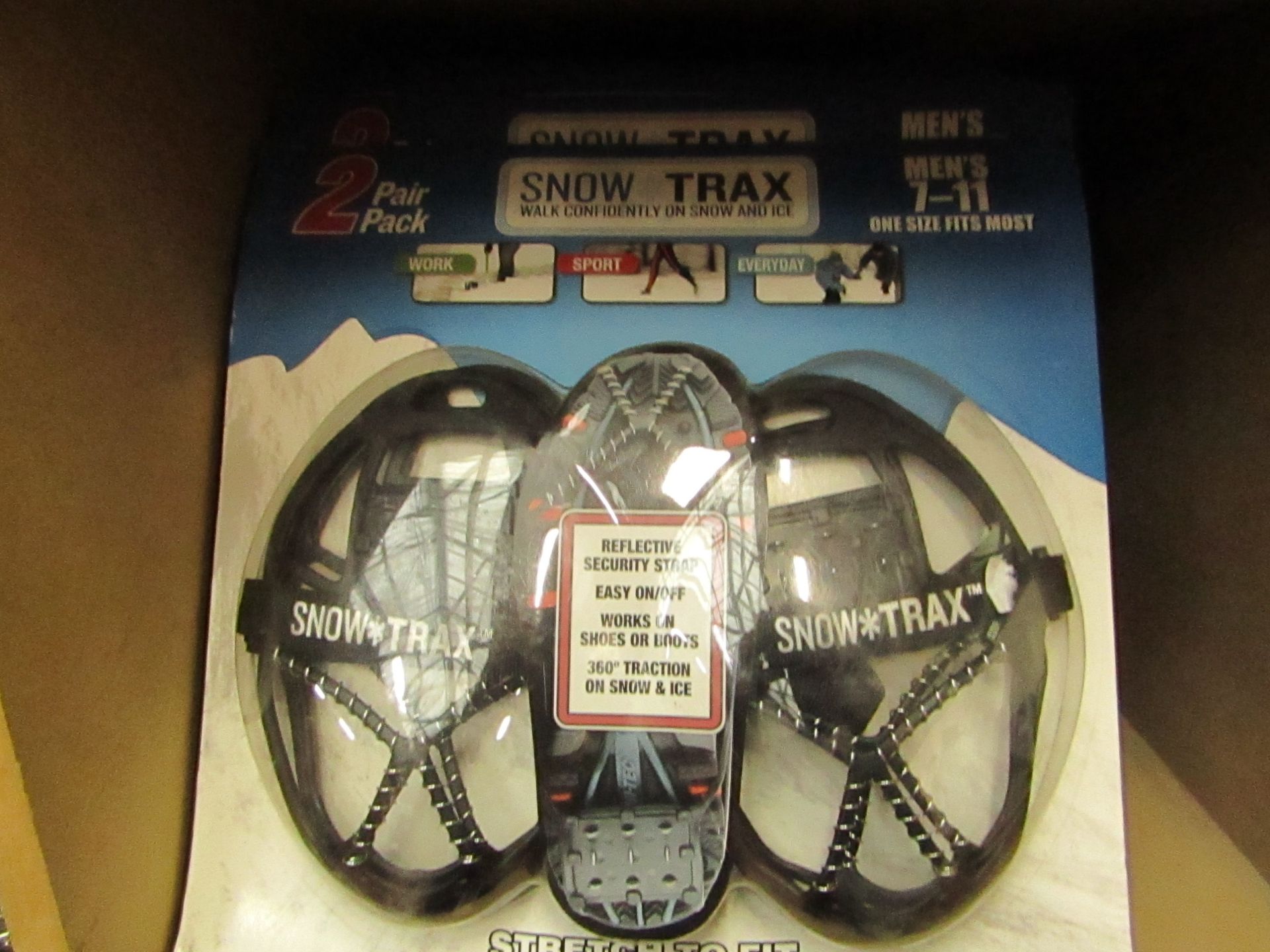 Snow Trax snow grips, 7 - 11, new and packaged.