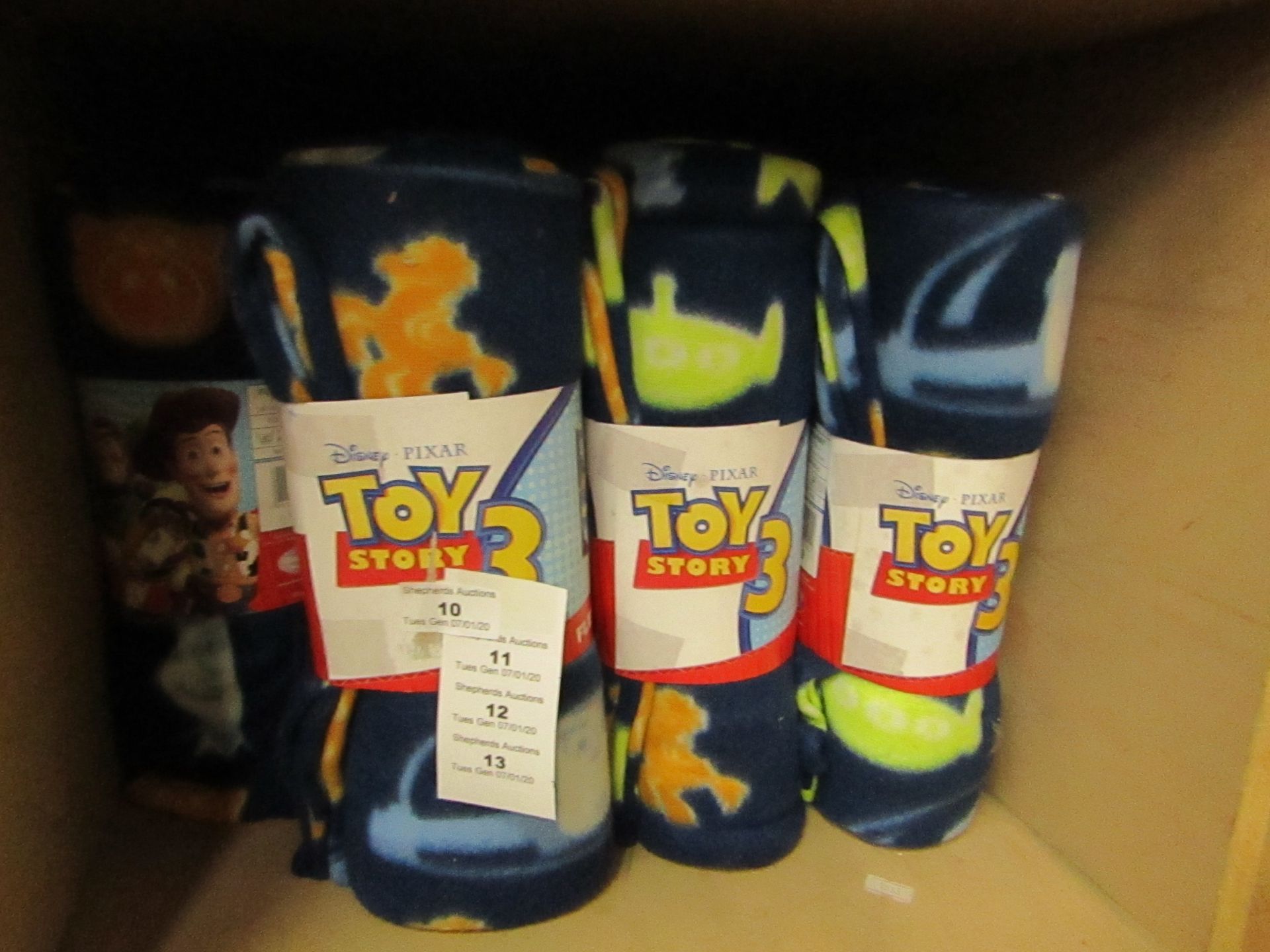 Toy Story 3 fleece blanket, new and packaged.