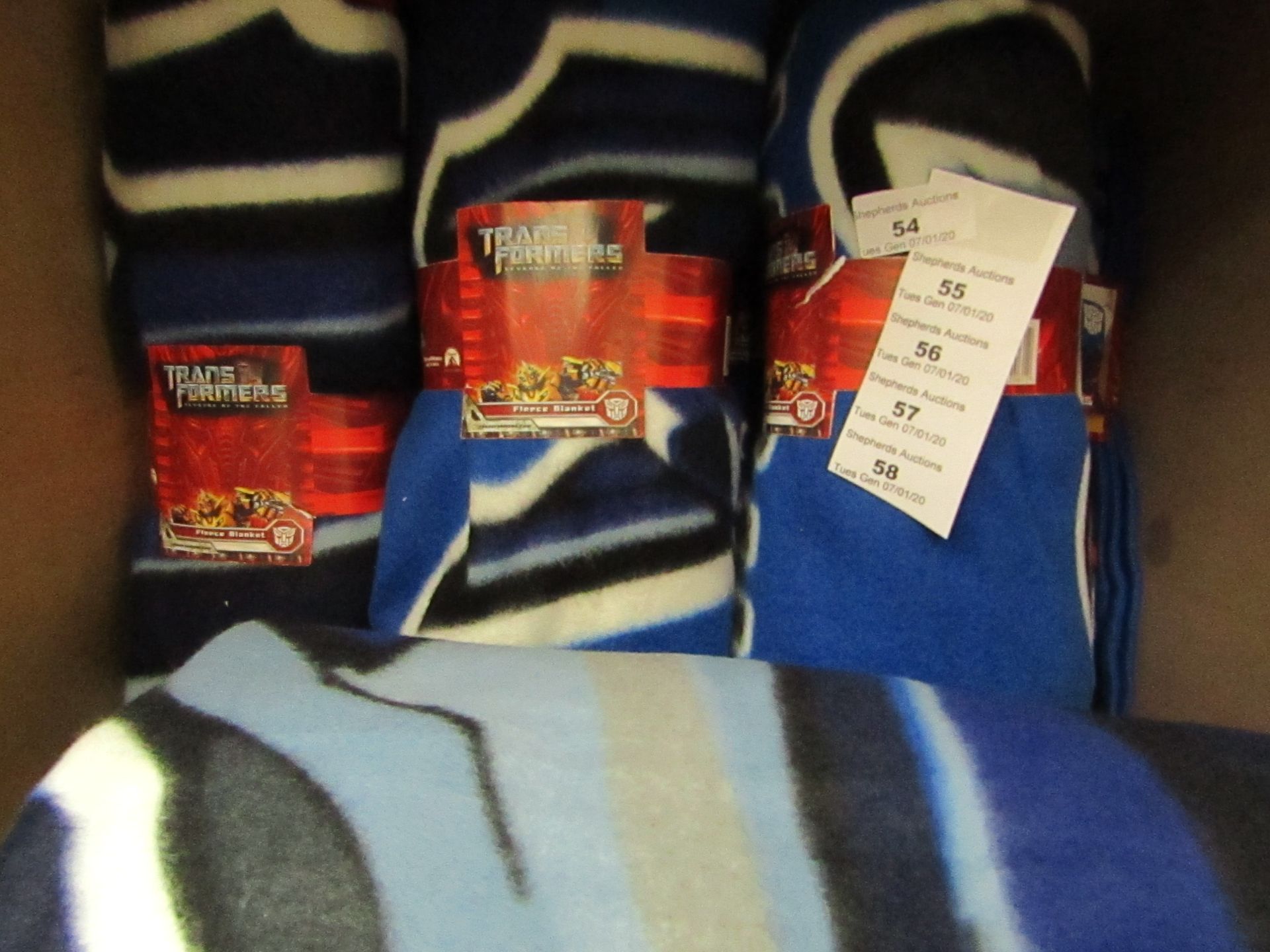 Transformers fleece blanket, new and packaged.