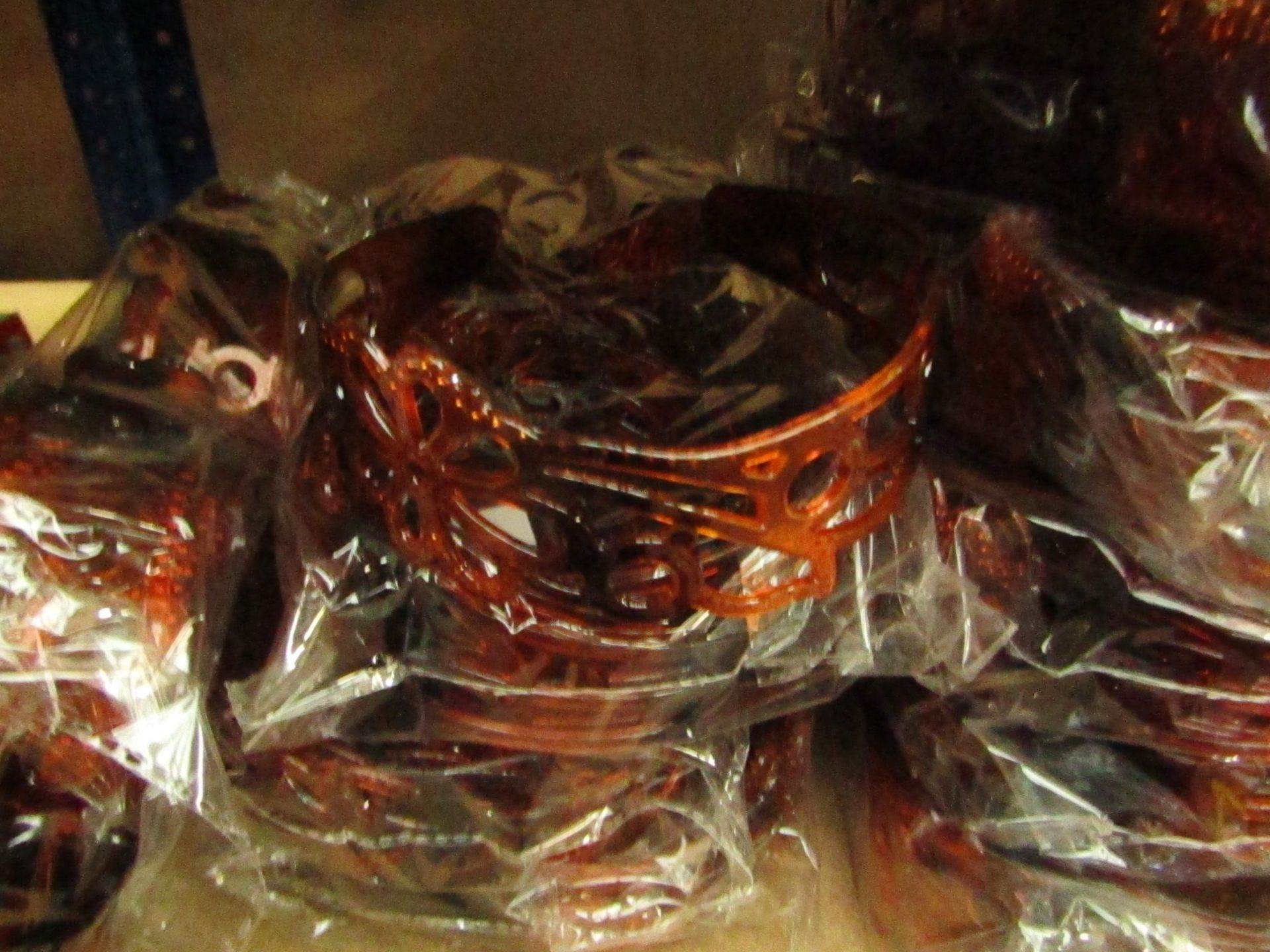 Pack of 12 Head-Bands - (brown) All packaged. - See Image.