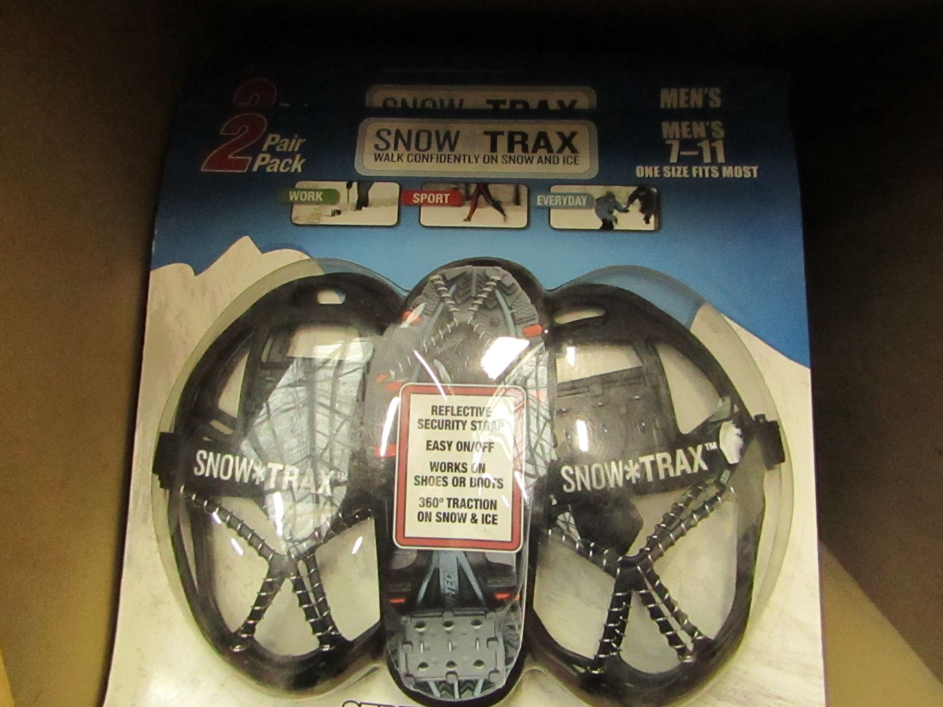 Snow Trax snow grips, 7 - 11, new and packaged.