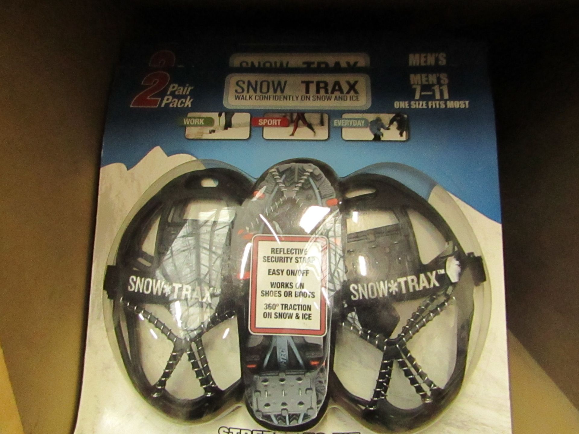 Snow Trax snow grips, 7 - 11, new and packaged.