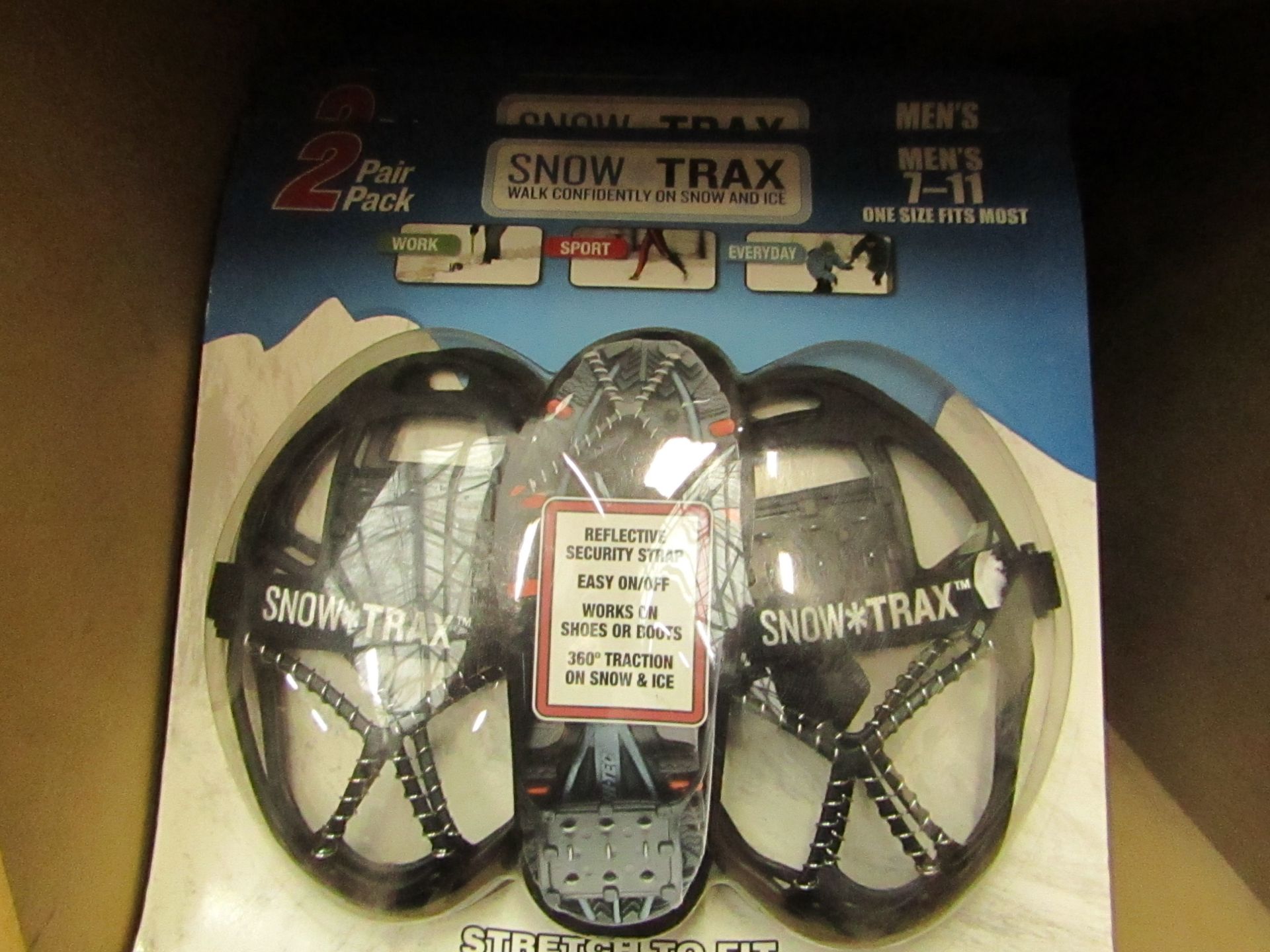 Snow Trax snow grips, 7 - 11, new and packaged.