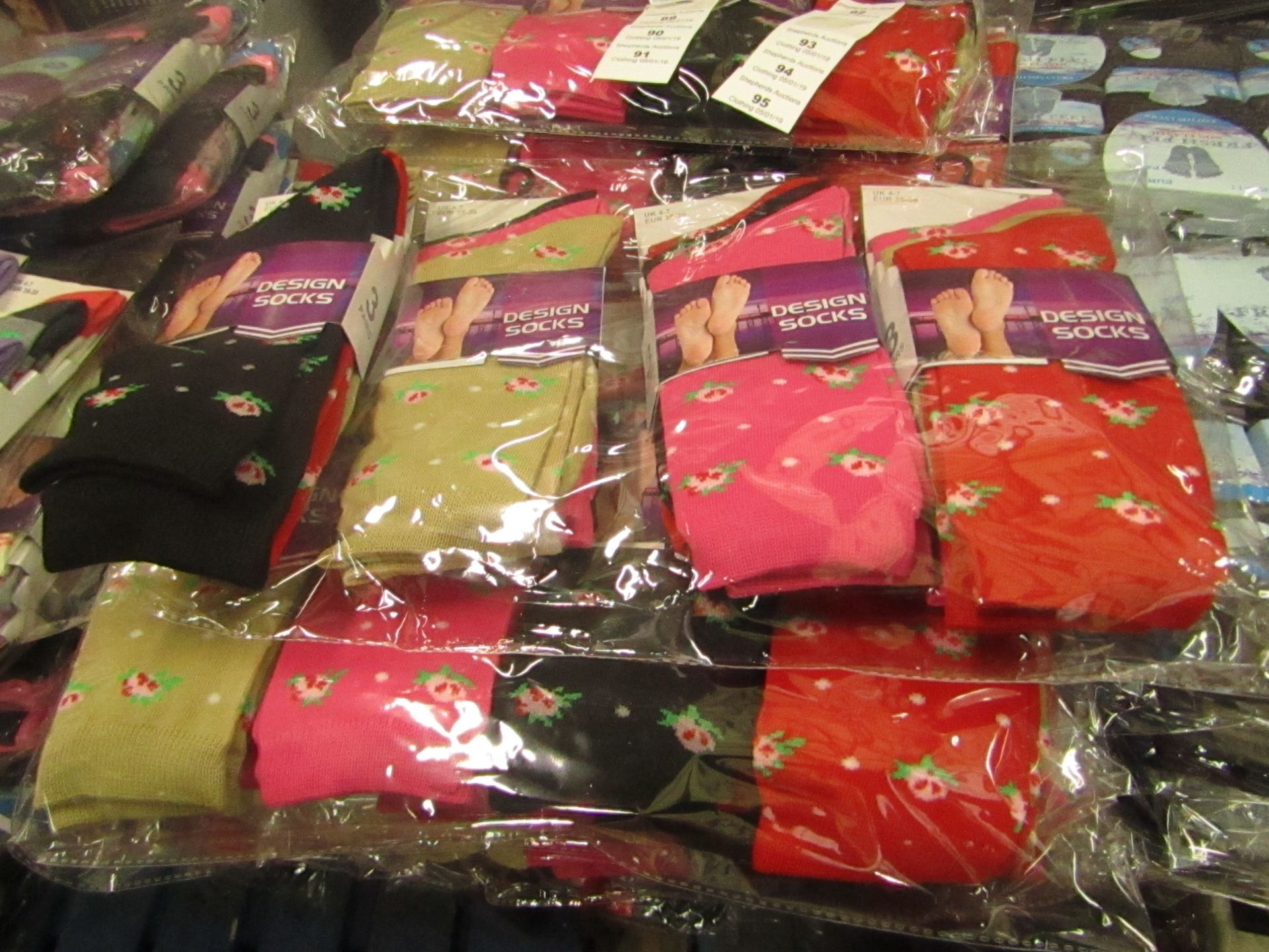 Pack of 12 x pairs Ladies Design Socks size 4-7 all new in packaging see image for design