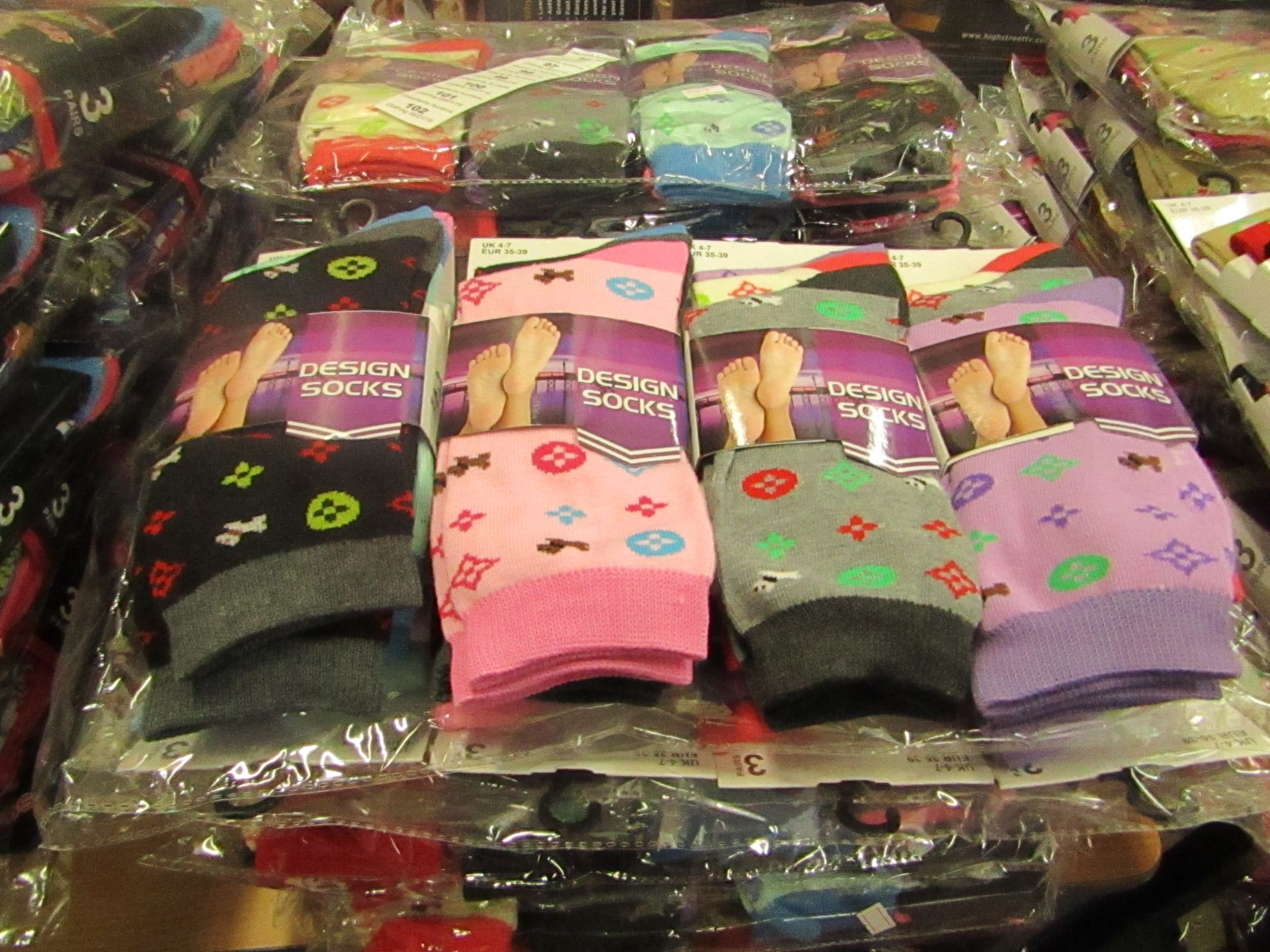 Pack of 12 x pairs Ladies Design Socks size 4-7 all new in packaging see image for design