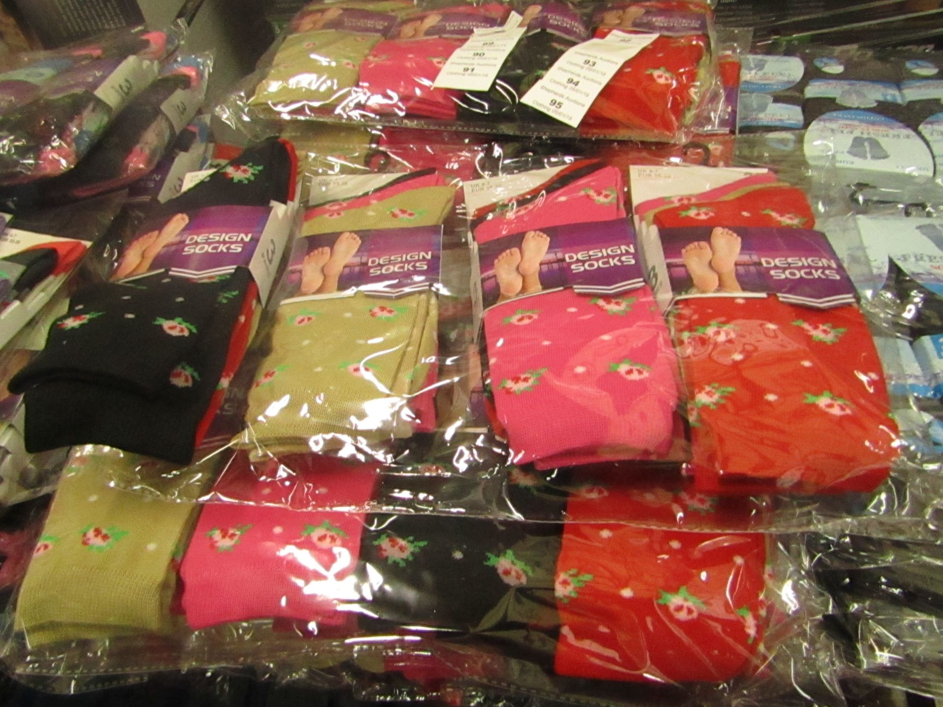 Pack of 12 x pairs Ladies Design Socks size 4-7 all new in packaging see image for design