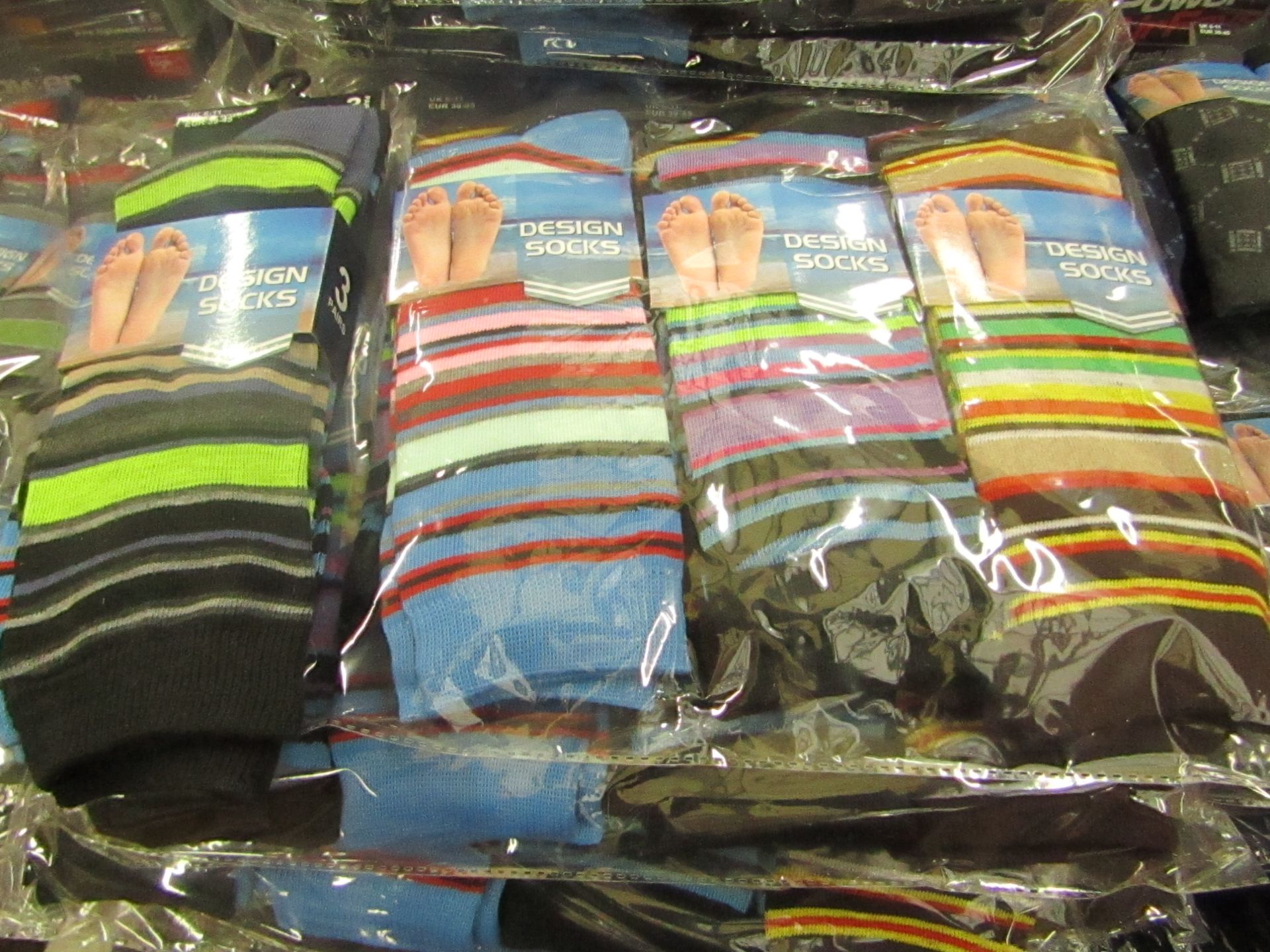 Pack of 12 x  pairs Mens Design Patterned Socks size 6-11 all new in packaging