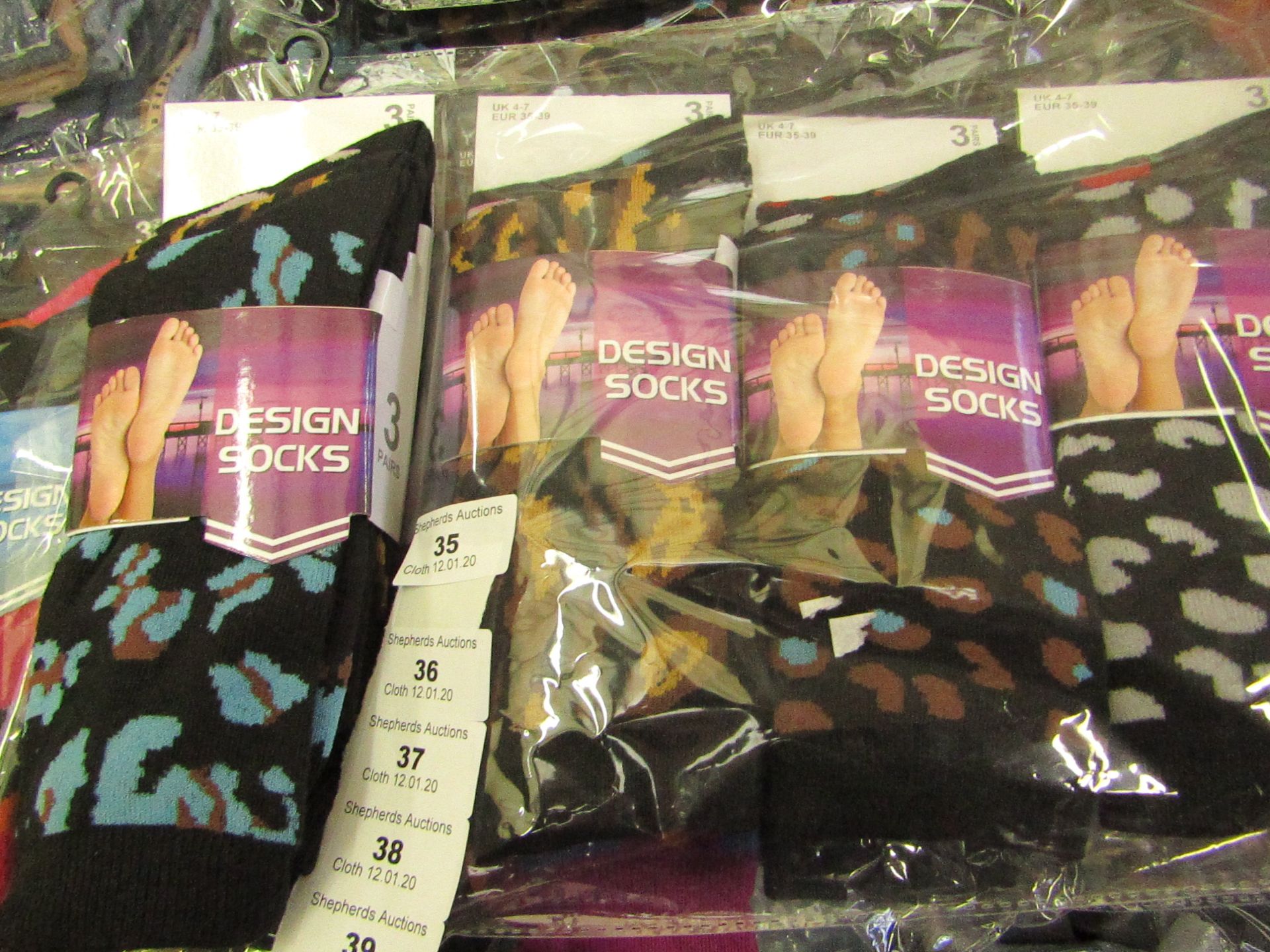 12 X Pairs of Ladies Design Socks size 4-7 new in packaging