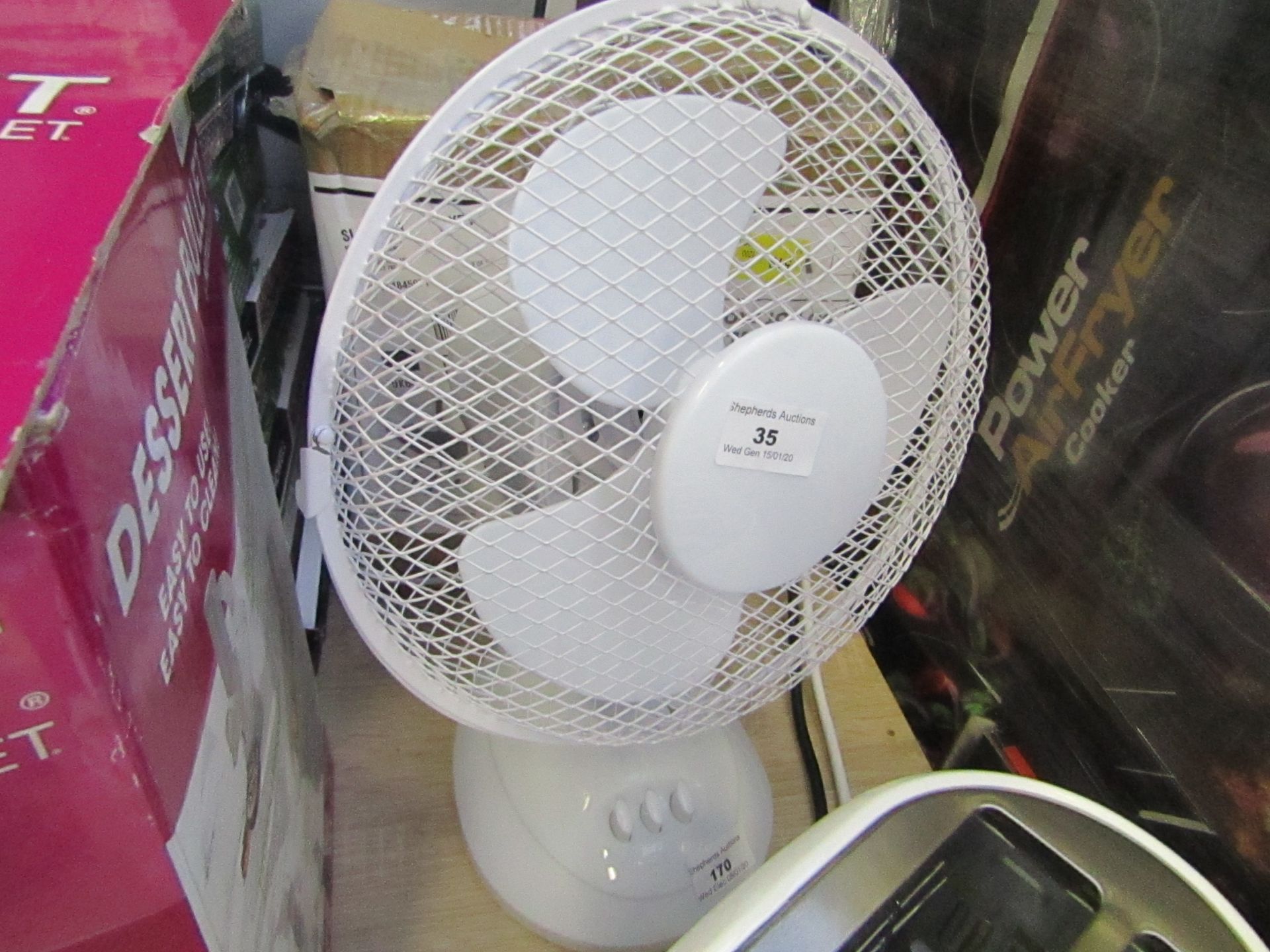 Desk fan with 2 speed settings, untested and boxed.