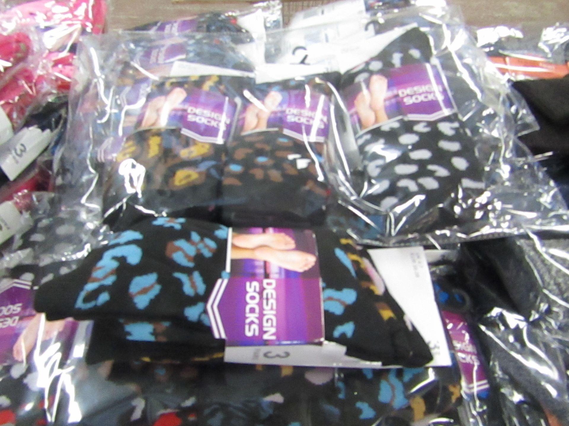 12 X Pairs of Ladies Design Socks size 4-7 new in packaging