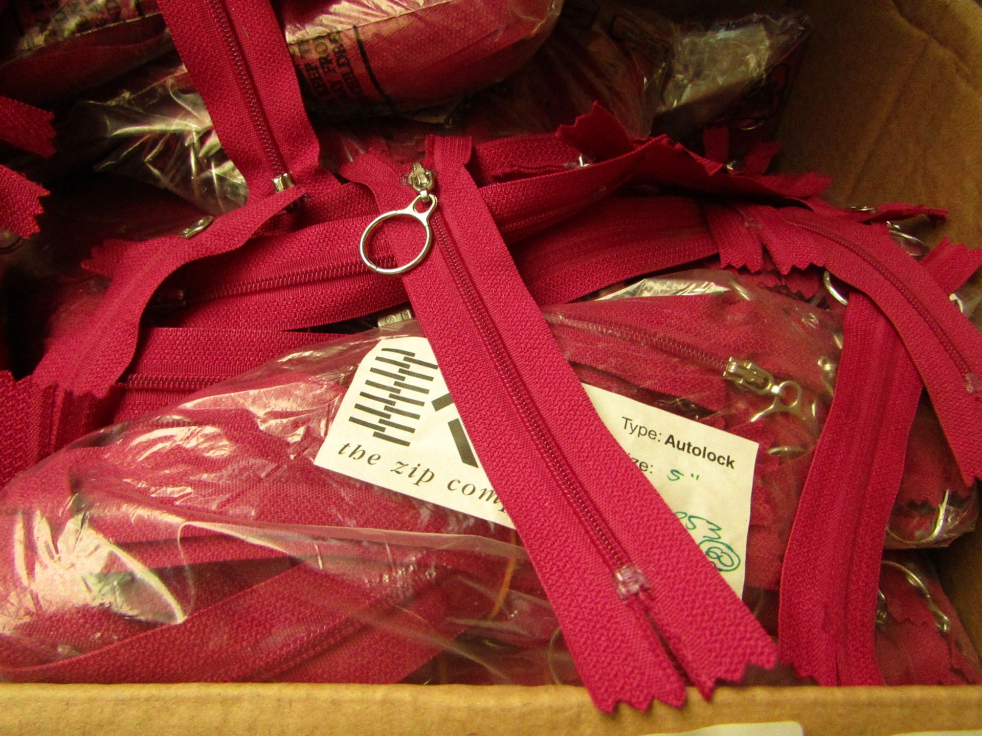5 Packs of 100 Pink Zips. Unused & Bagged