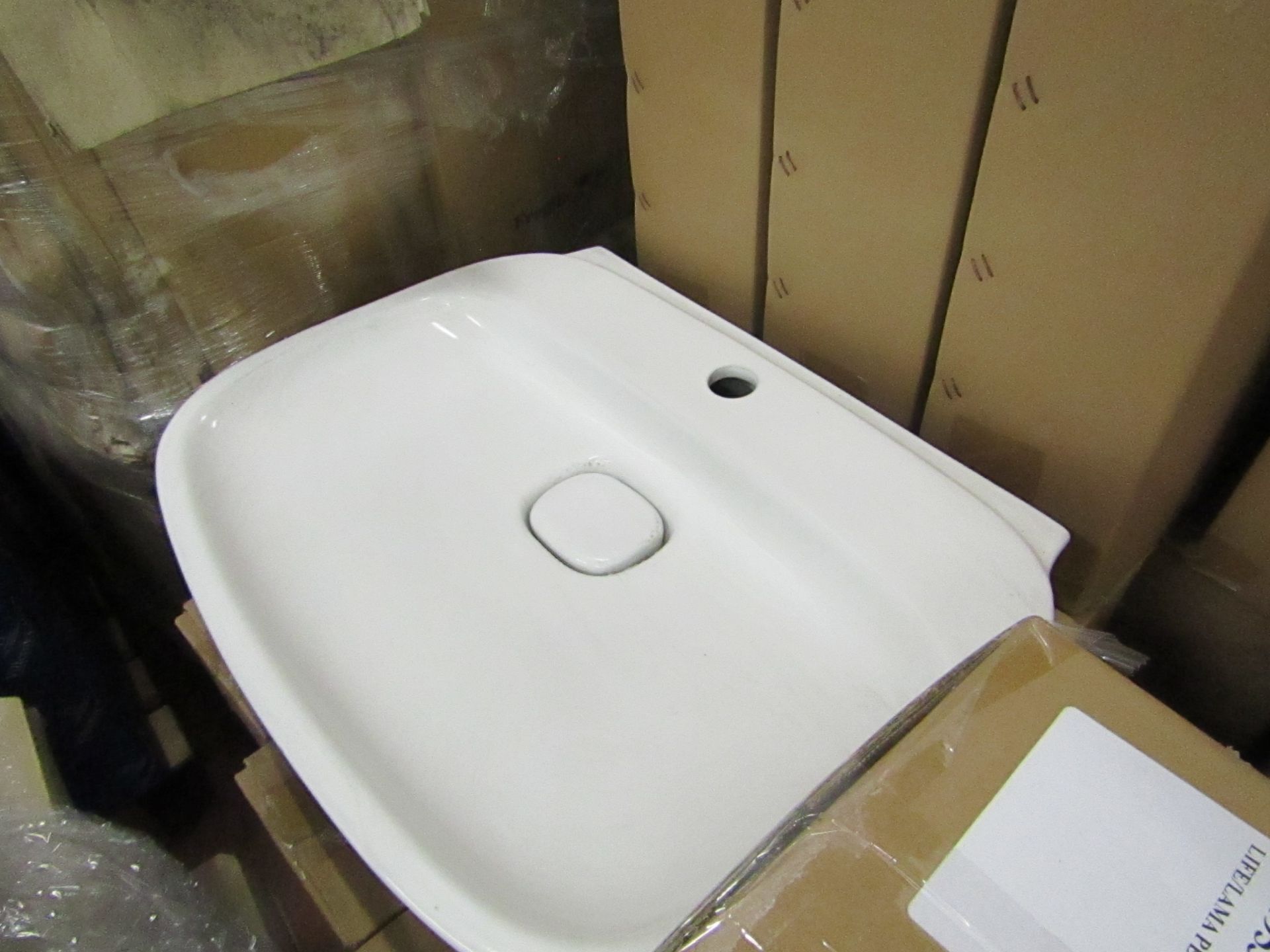 Laufen 600mm 1TH basin with waste trap ceramic cover and universal full pedestal, new and boxed.