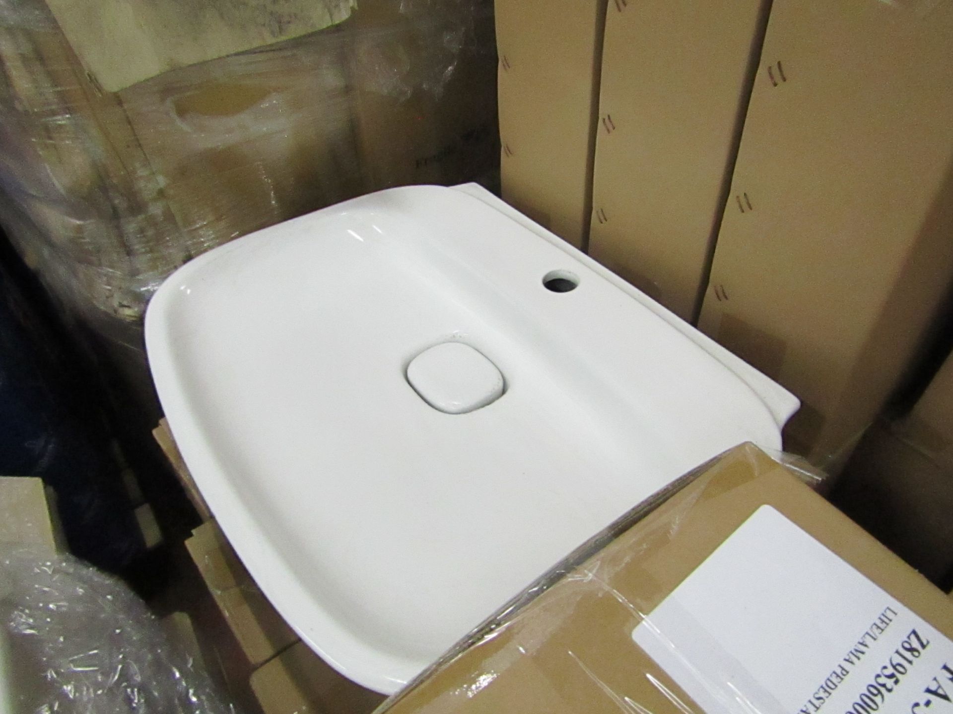 Laufen 600mm 1TH basin with waste trap ceramic cover and universal full pedestal, new and boxed.