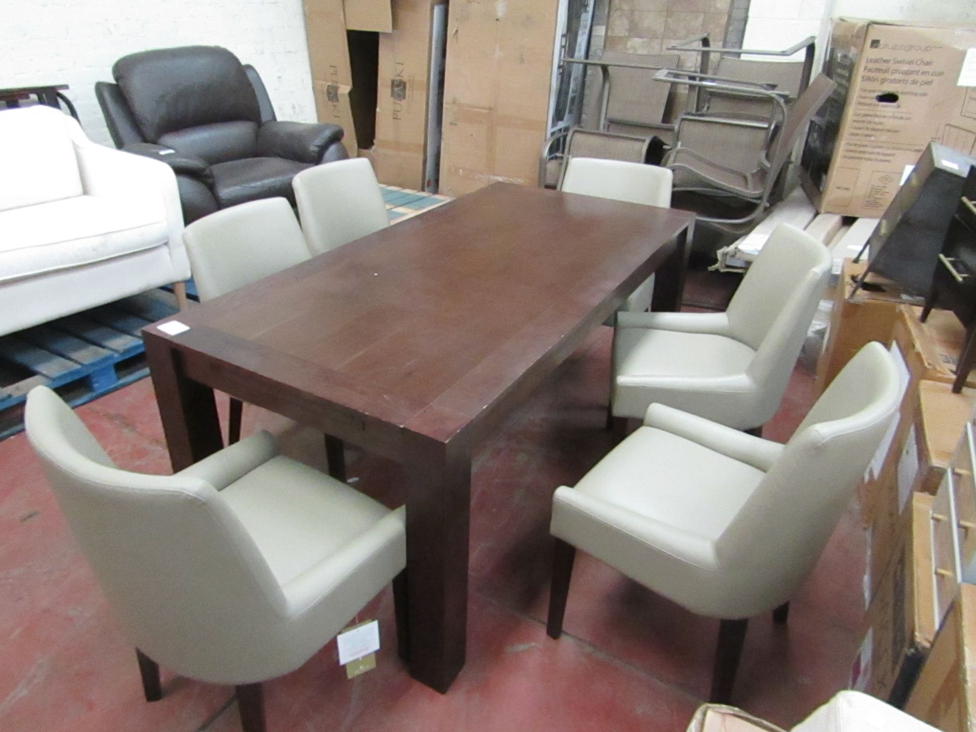 Dining table with 6 Chairs, a few if the chairs have marks on them and the table has a few surface