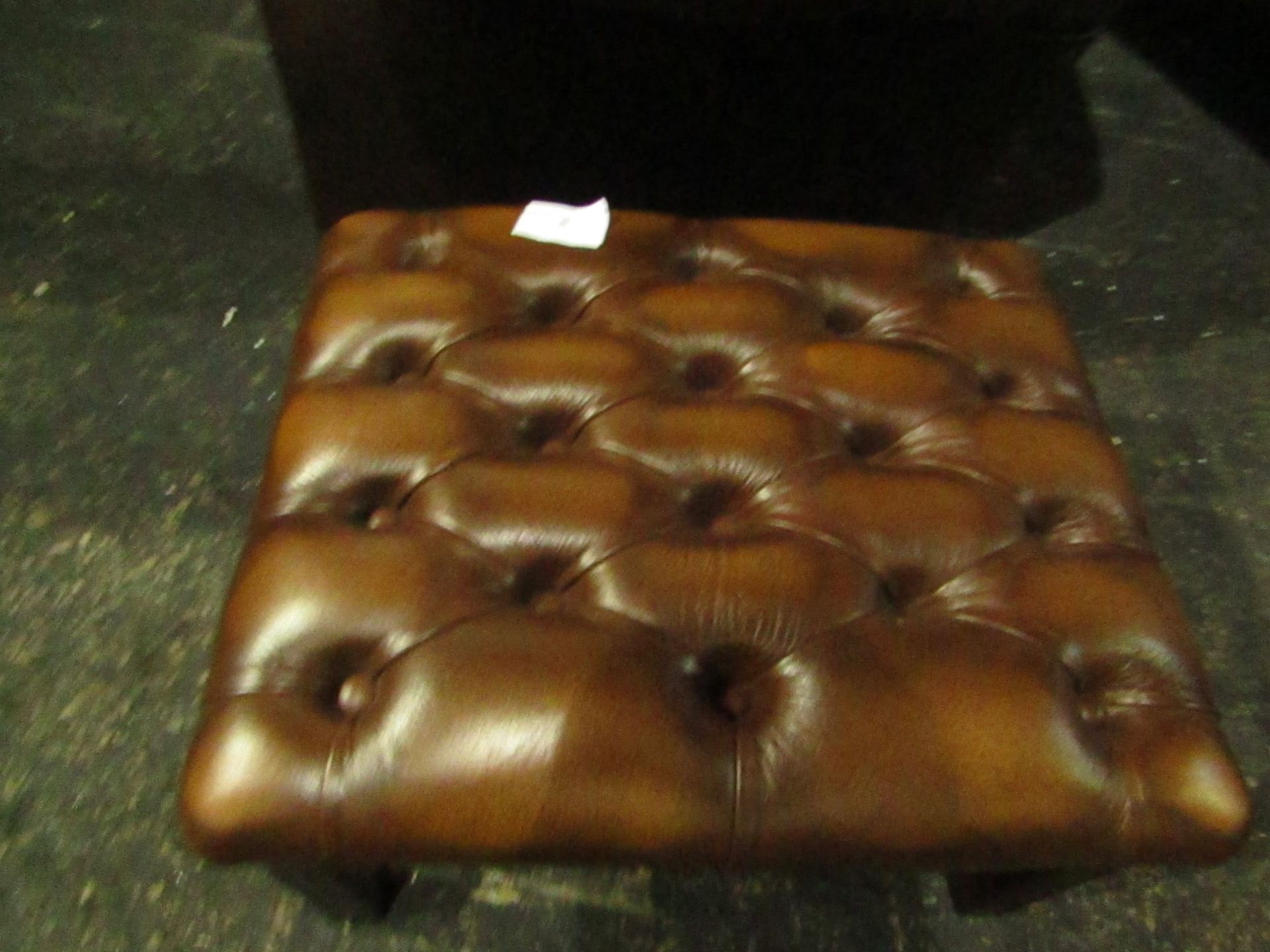 Leather foot stool, Ex display.