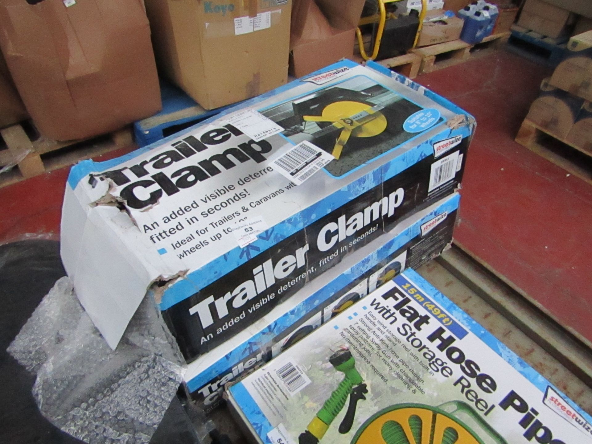 2x Streetwize trailer clamp, unchecked and boxed.