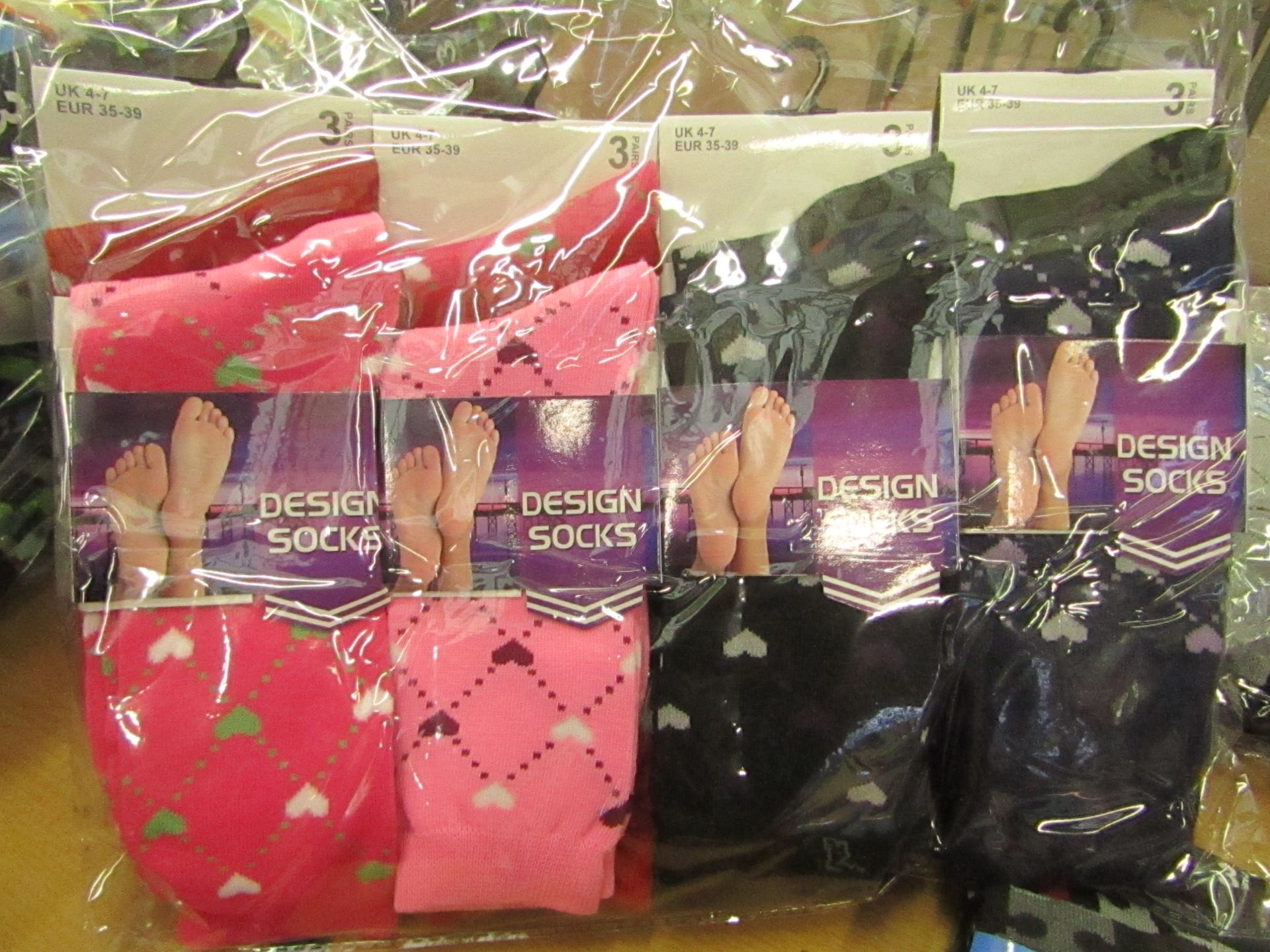 12 X Pairs of Ladies Design Socks size 4-7 new in packaging