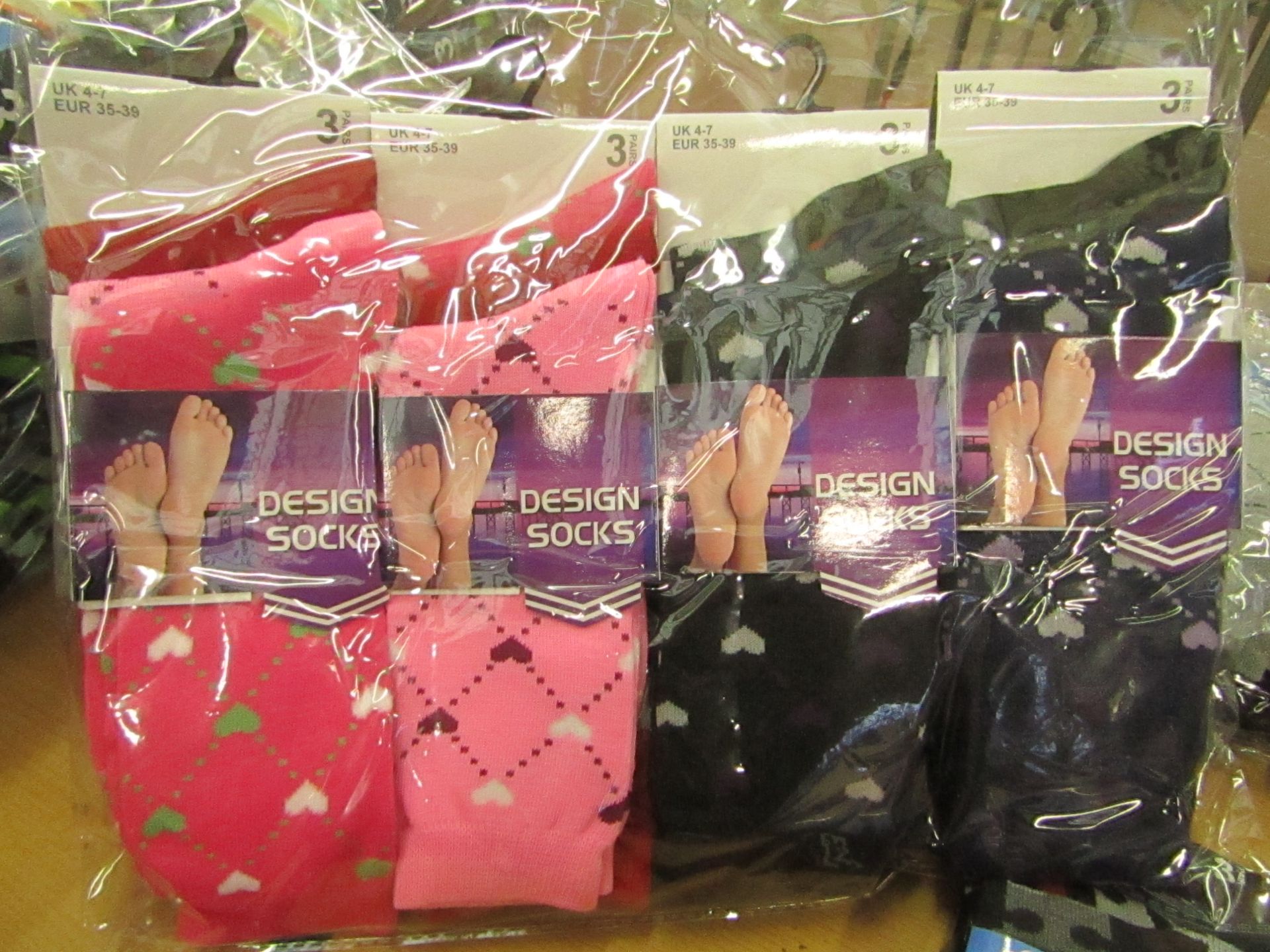 12 X Pairs of Ladies Design Socks size 4-7 new in packaging