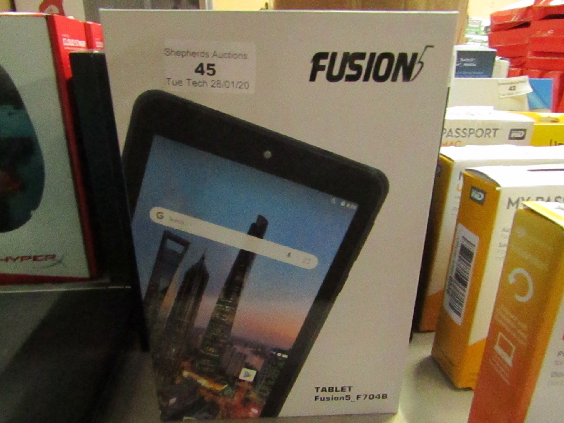 Fusion 5 tablet, untested and boxed.