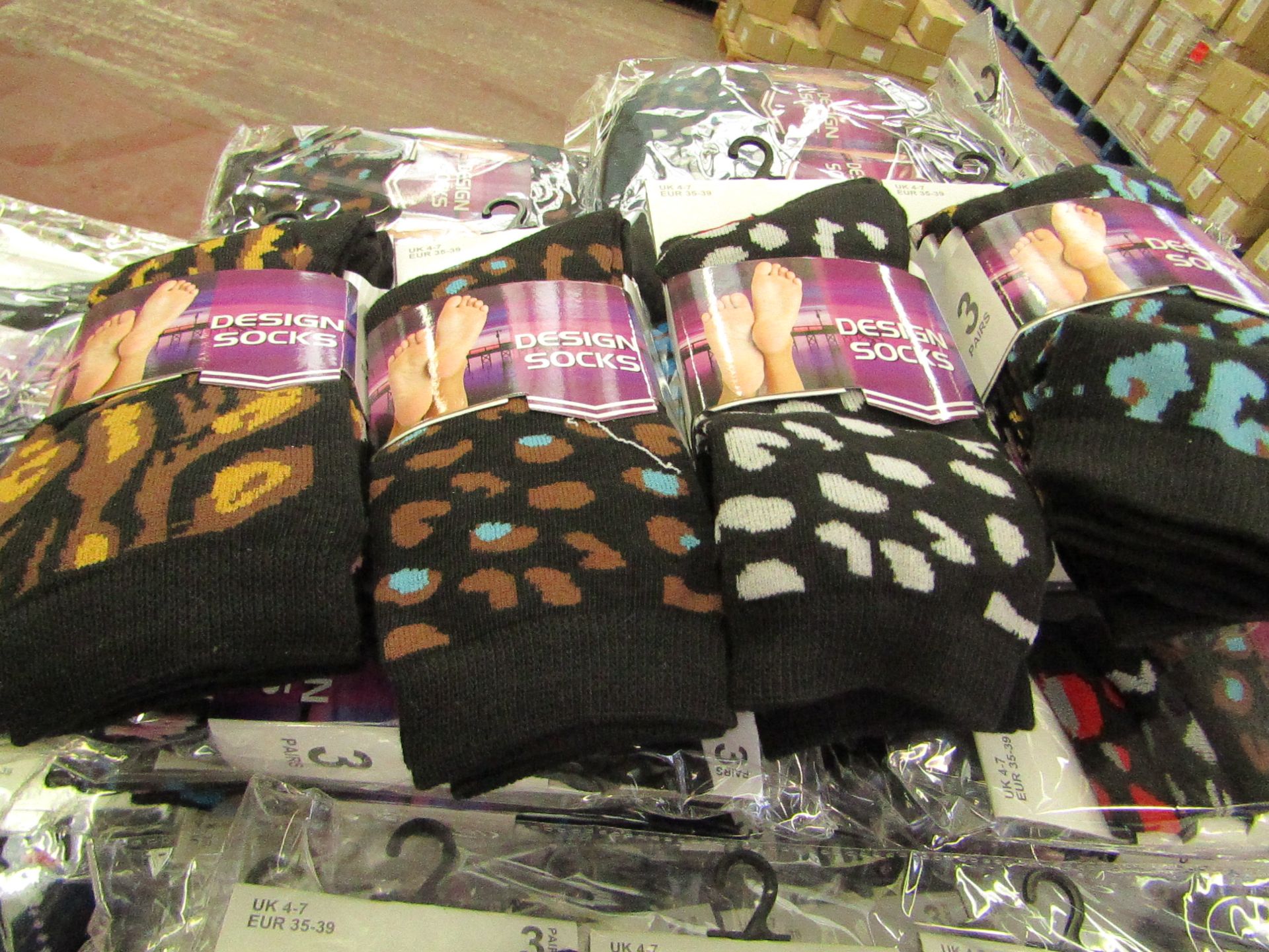 12 X Pairs of Ladies Design Socks size 4-7 new in packaging