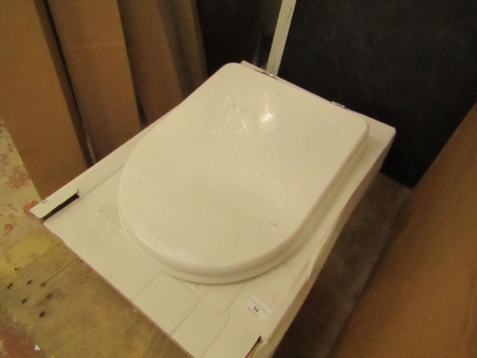 Unbranded Roca Toilet Seat - New and Boxed.