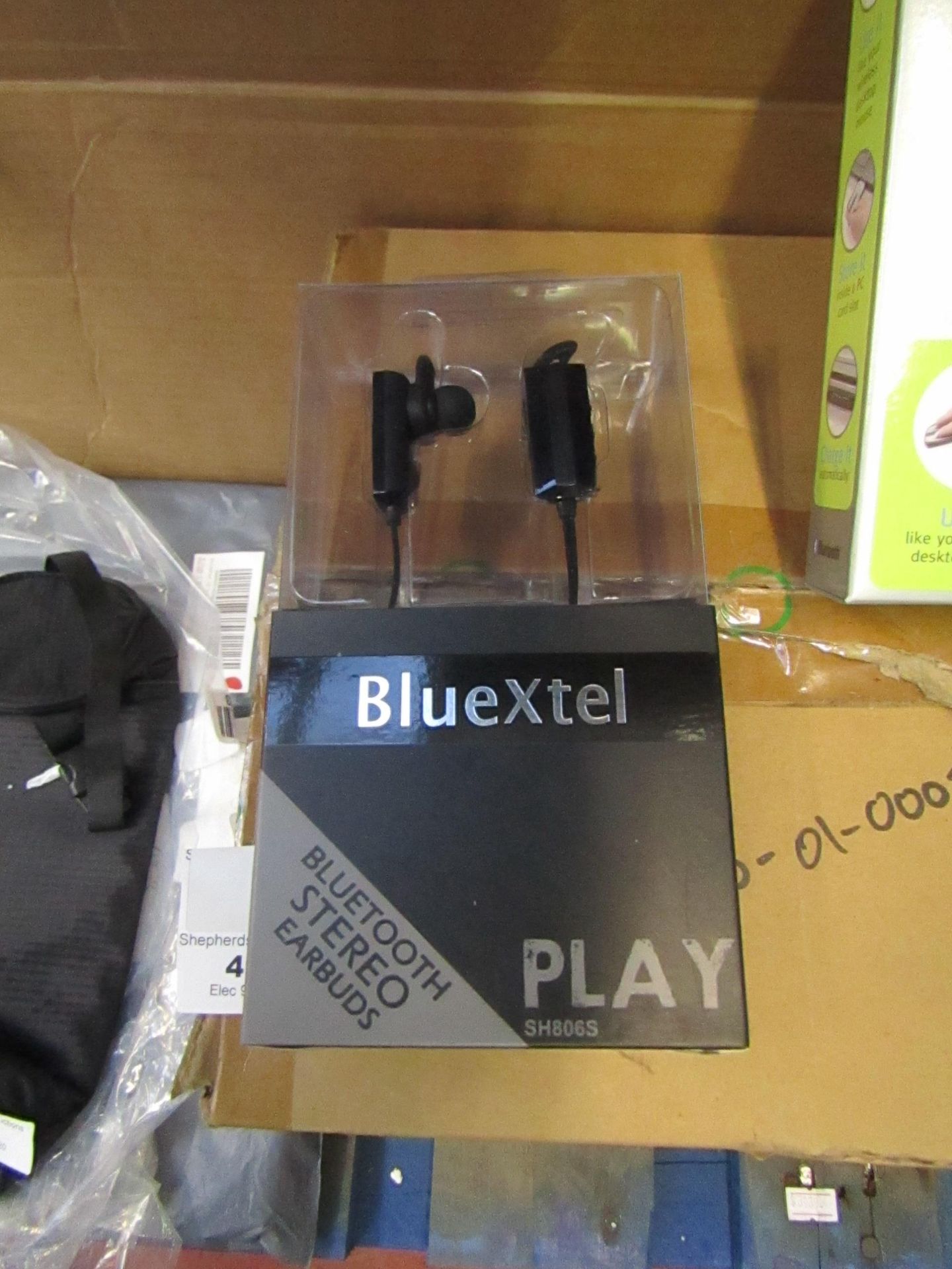 BlueXtel Bluetooth stereo earbuds, new and packaged.