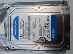 Western Digital 1TB hard drive, untested.