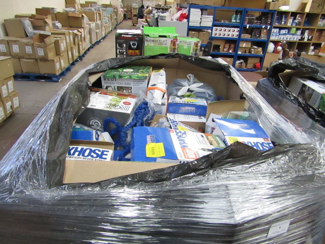 Pallets of Air beds and RAw customer return Electricals.