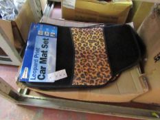 Set of 4 leopard print car mats, new and packaged.