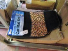 Set of 4 leopard print car mats, new and packaged.