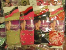 12 X Pairs of Ladies Design Socks size 4-7 new in packaging