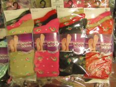 12 X Pairs of Ladies Design Socks size 4-7 new in packaging