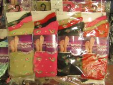 12 X Pairs of Ladies Design Socks size 4-7 new in packaging