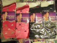 12 X Pairs of Ladies Design Socks size 4-7 new in packaging