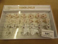 24 x various sized Decorative Rings (see image for designs) new & packaged