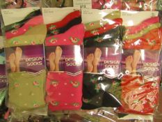 12 X Pairs of Ladies Design Socks size 4-7 new in packaging