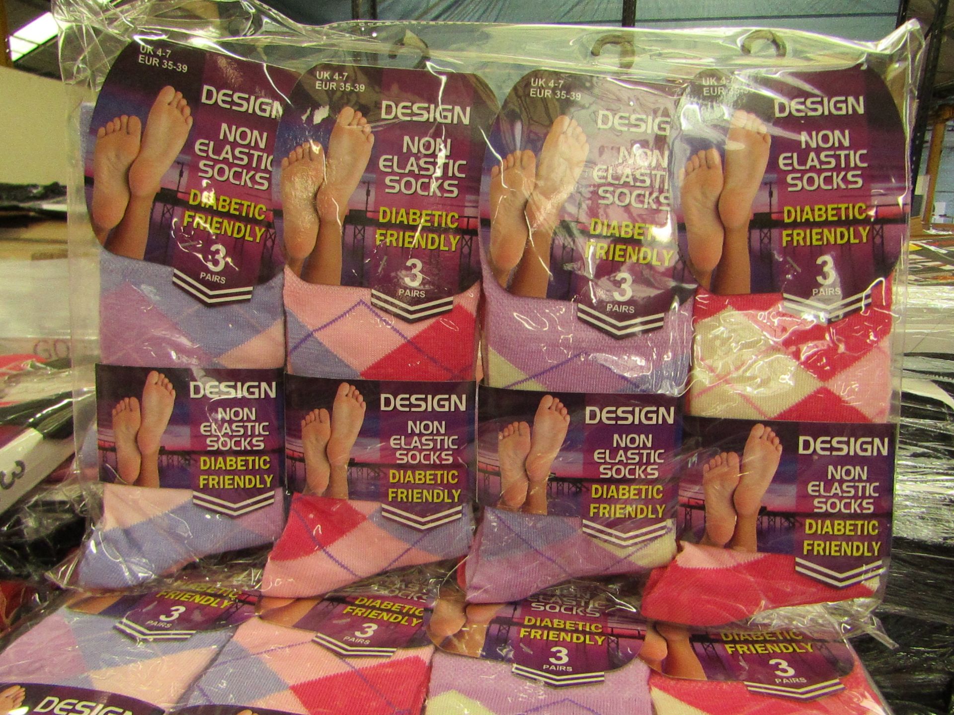 12 x Pairs of Ladies Design Non Elastic Socks size 4-7 new in packaging