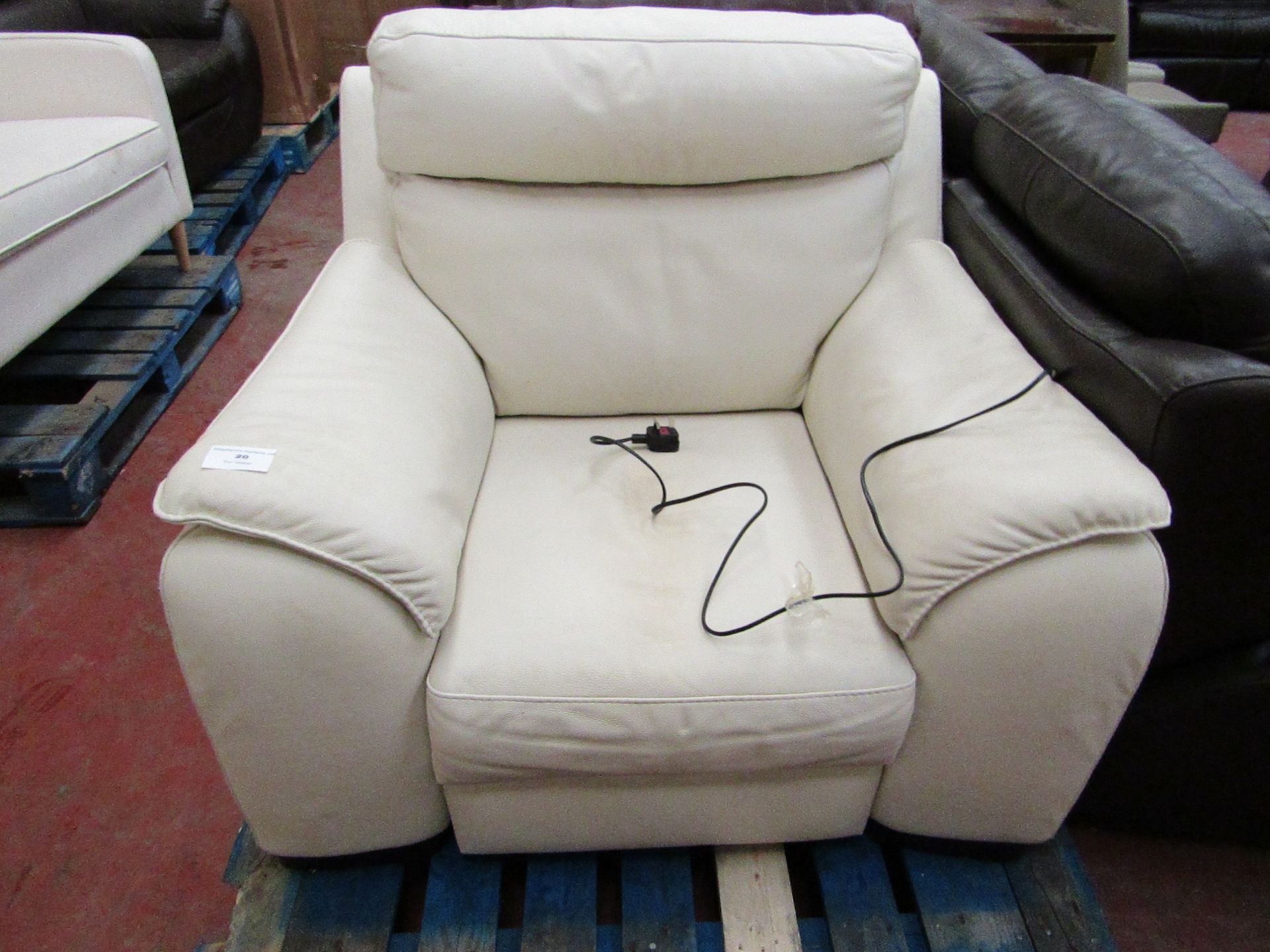 Cream Leather Electric reclining armchair, mechanism is working