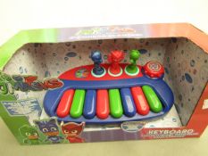 PJ Masks keyboard, new and in damaged packaging.