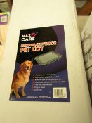 Max Care indoor and outdoor pet cot, new and boxed.