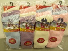 12x Pairs of warm winter thermal socks, size 4-7, new and packaged.