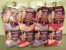 12x Pairs of non elastic socks, size 4-7, new and packaged.
